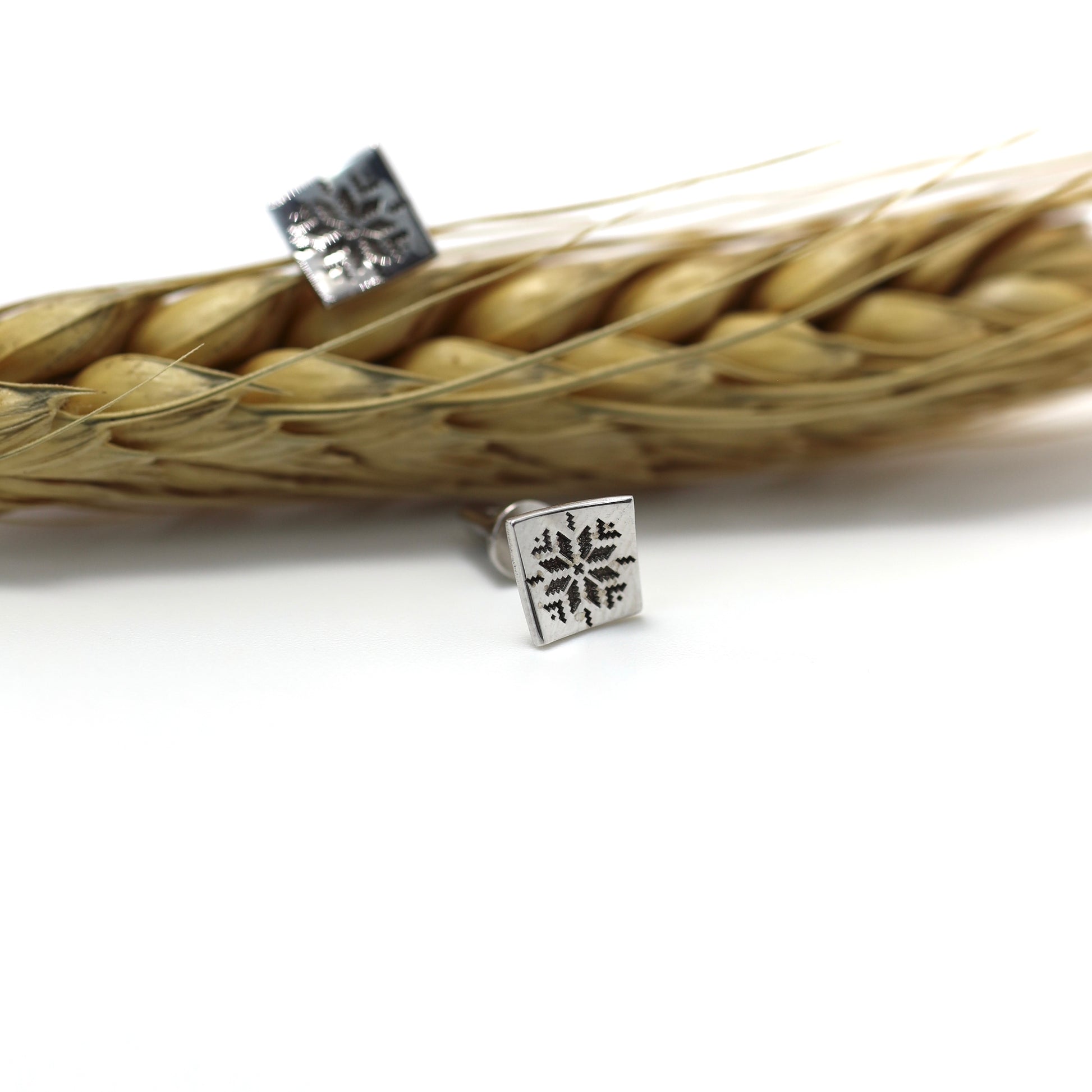 Sterling silver stud earrings with square ornament