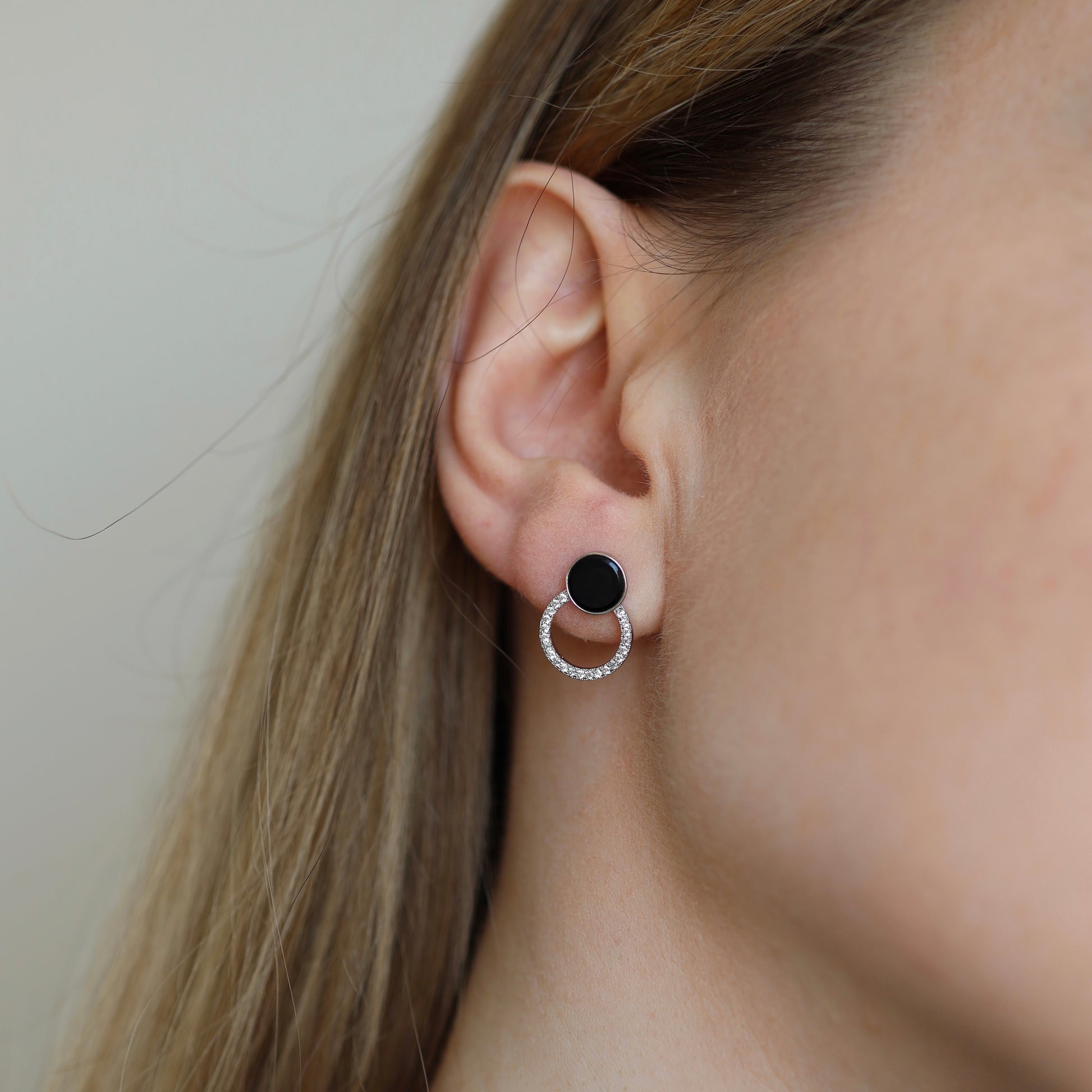 Stylish silver earrings with black stone for everyday wear.