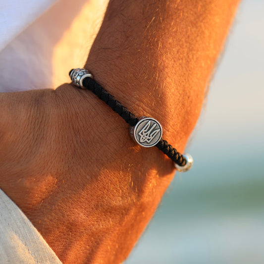 Close-up of men’s bracelet, luxury Ukrainian silver jewelry
