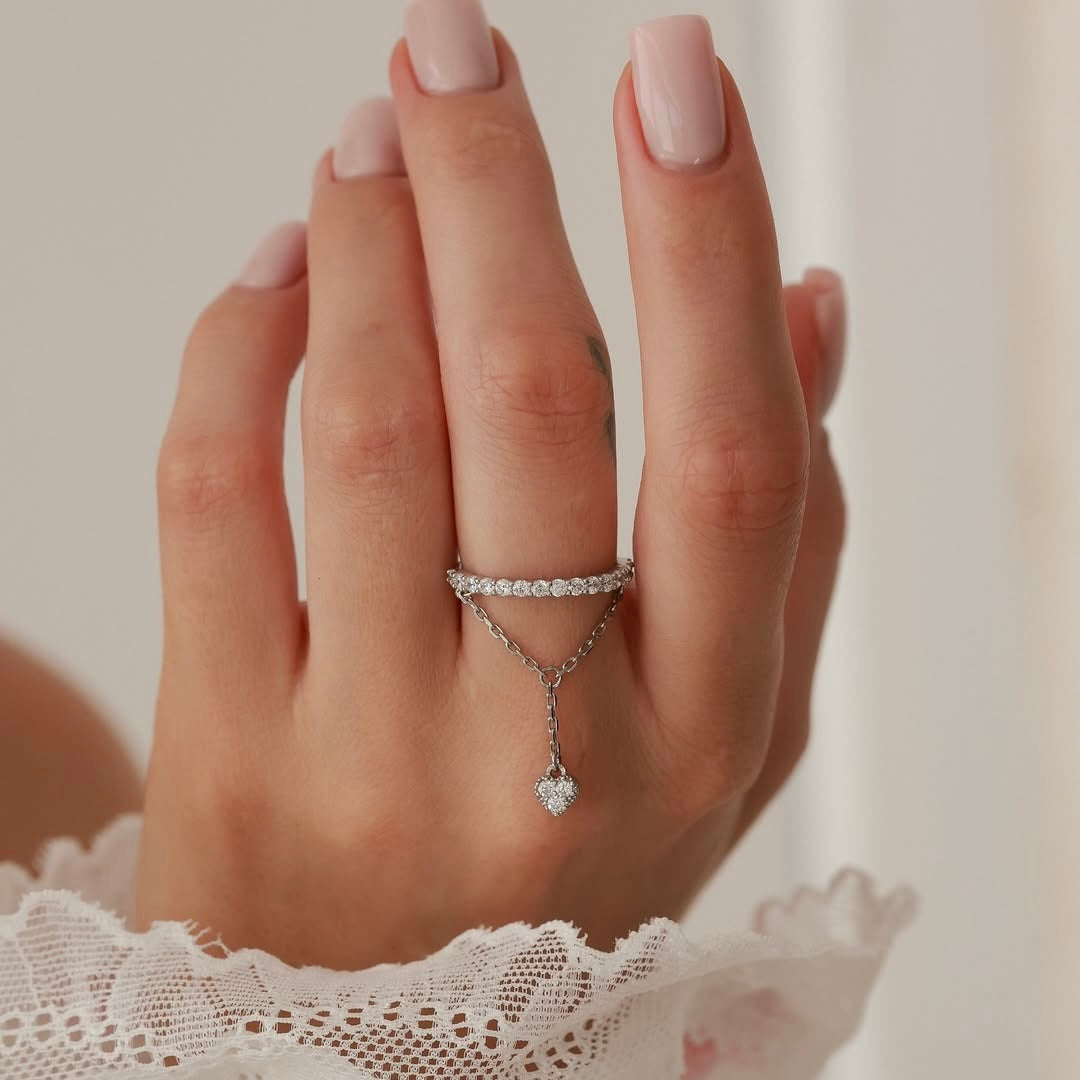 Срібна каблучка з фіанітами/340